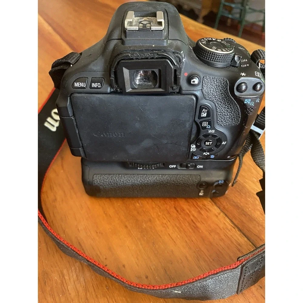 Canon EOS Rebel T3I 18 MP Digital SLR Camera with two Lenses, Charger And Bag
